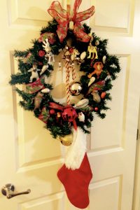 Holiday Tips for Caregivers: Feature a special collection of small ornaments on a wreath rather than a tree