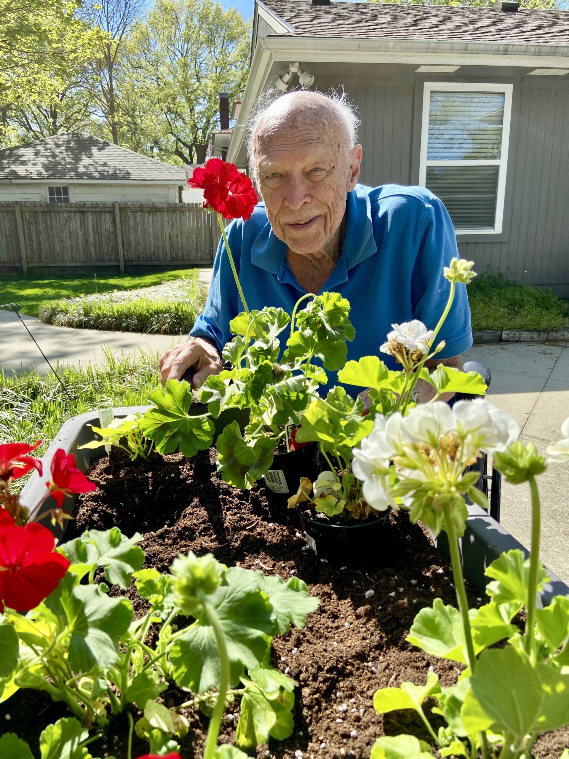 Memory care assisted living resident gardening