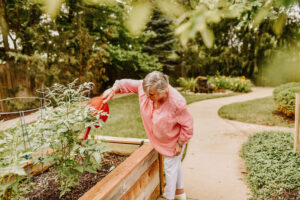 Watering the garden, one of our favorite memory care activities