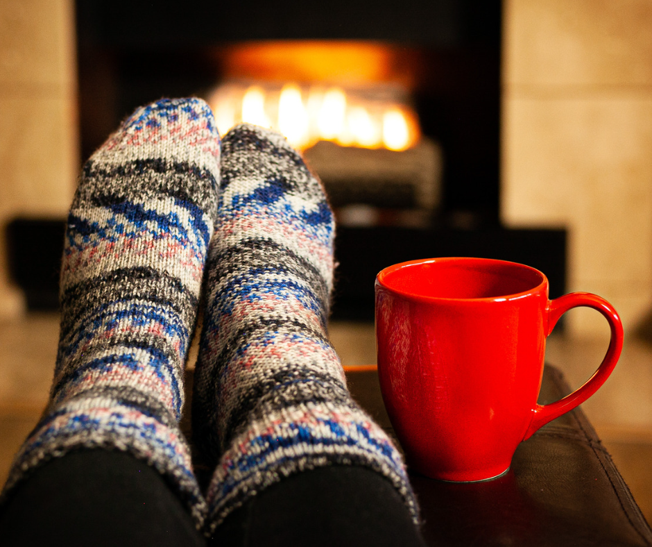 Winter safety tips: dress in warm layers, from head to toe, and hydrate! (Warm socks & hot beverage in front of fireplace)